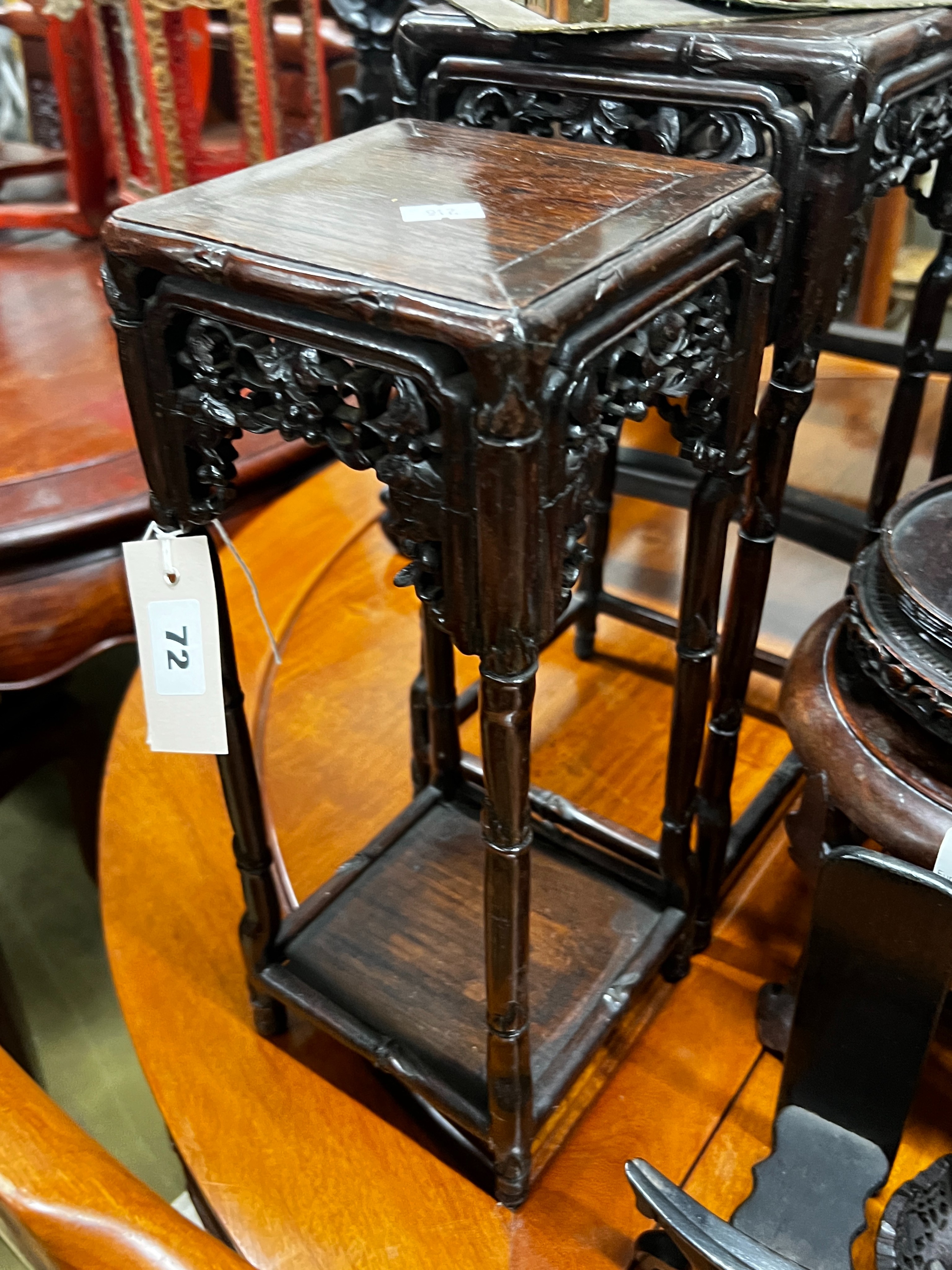 Seven assorted Chinese vase / plate hardwood stands together with two jadeite mounted bookends, largest height 40cm